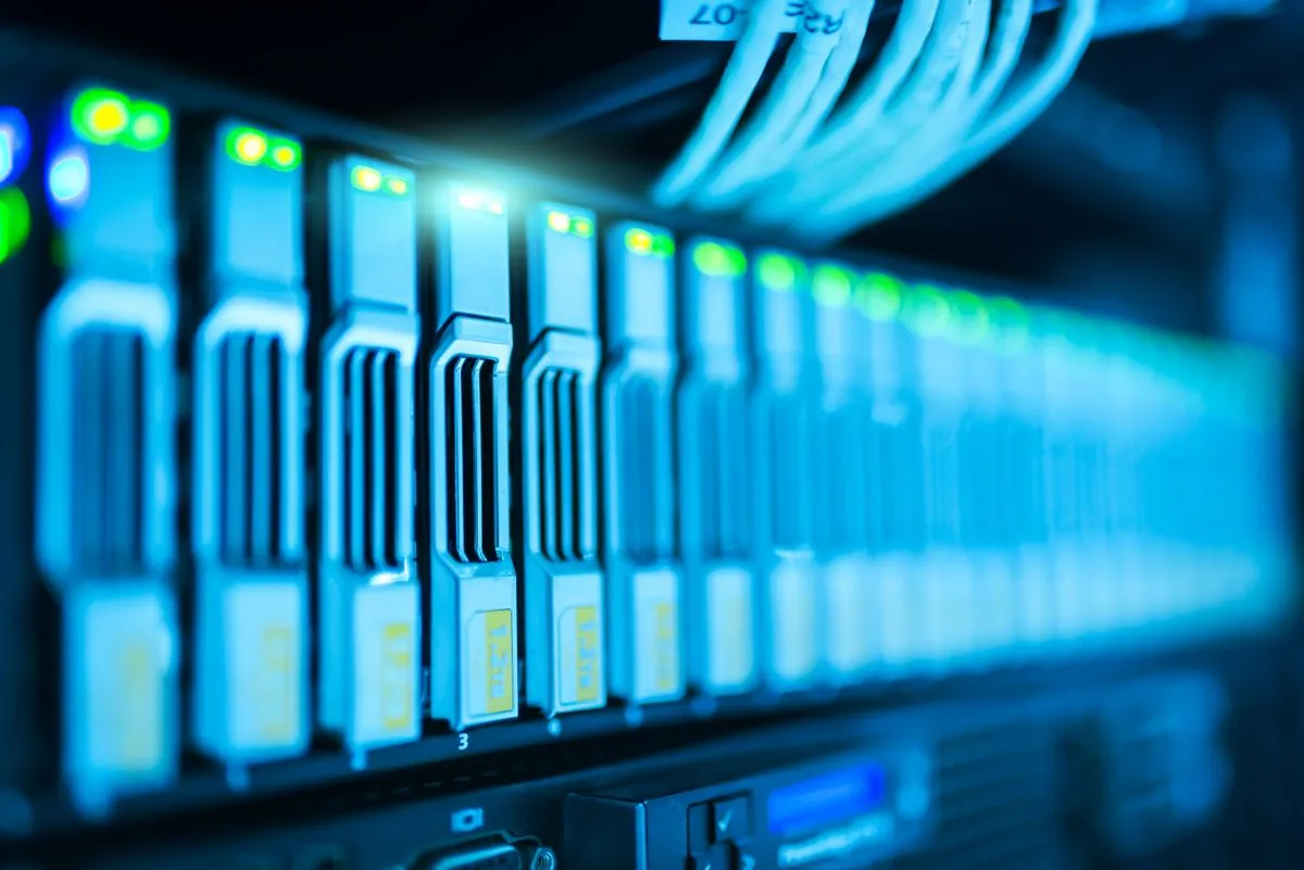 Server rack with glowing lights in a data center — representing the infrastructure behind website directories and backlink networks